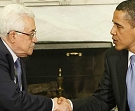 President Barack Obama shakes hands with Palestinian President Mahmoud Abbas in the Oval Office of the White House in Washington, May 28, 2009. (AP) 